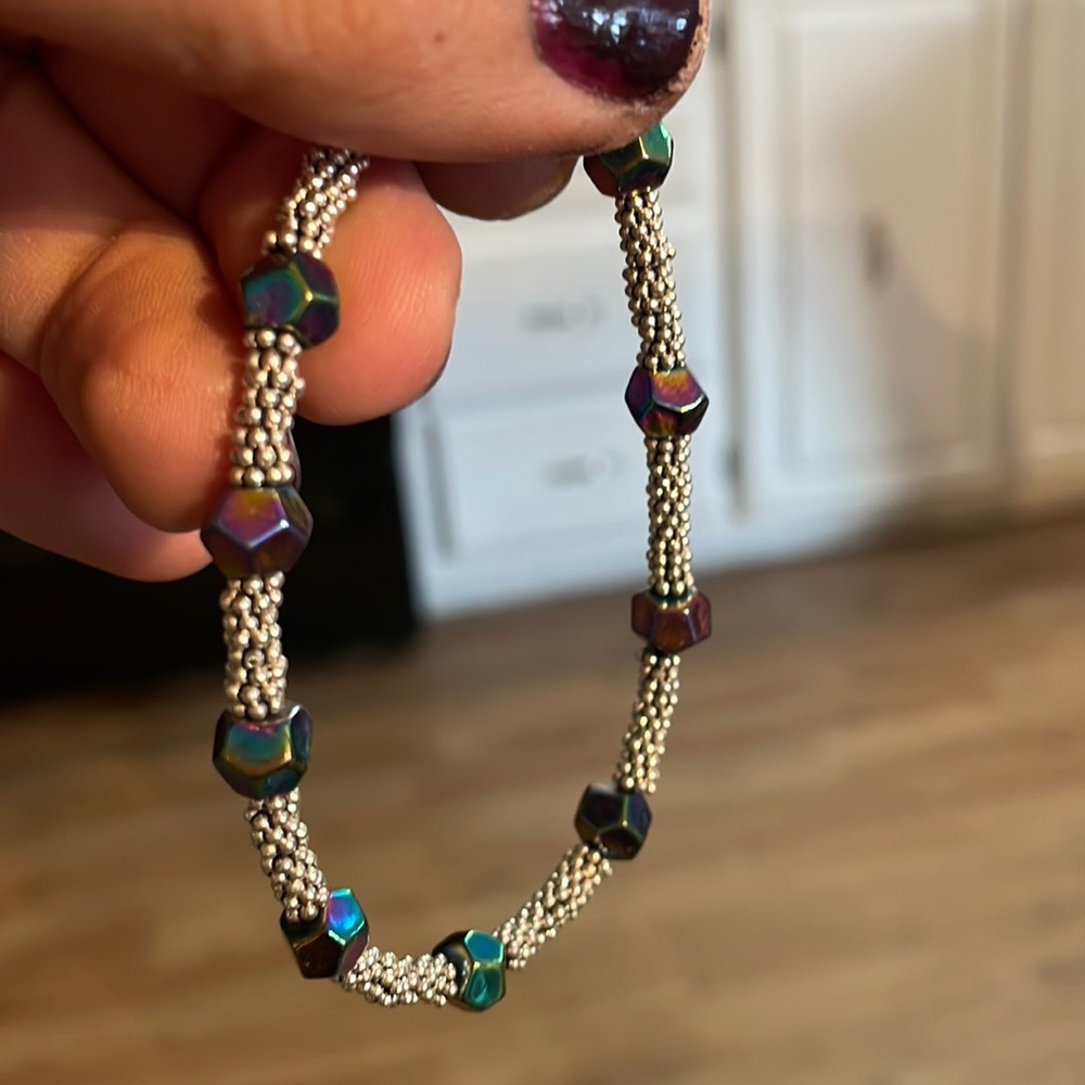 Mood beads that sparkle with sterling silver and a lobster claw closure